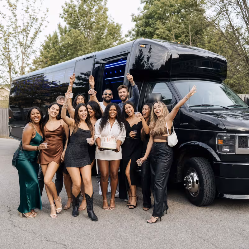 Party bus interior with wraparound leather seating and LED lighting in Tacoma