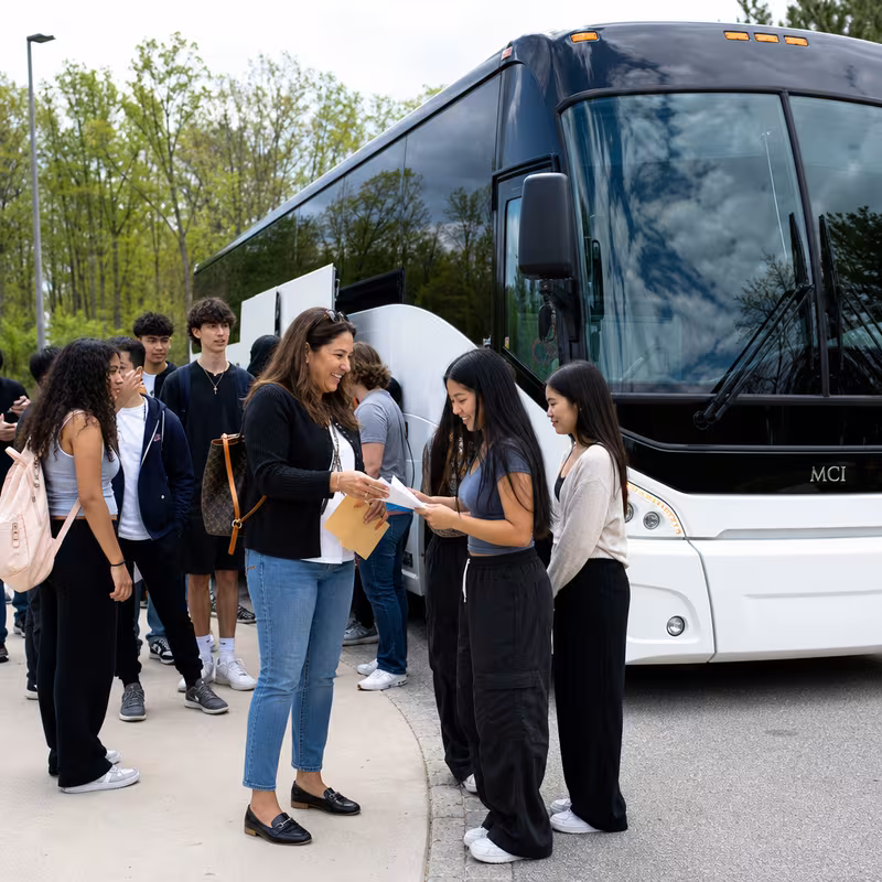 Black Mercedes Sprinter van staged for an Tacoma School Transportation group
